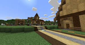 A screenshot taken inside of Grenze. A work area, the train station, and house are visible from left to right respectively. All in a block pallette of dark oak, oak, and stone. There is a path connecting the three buildings on the ground.